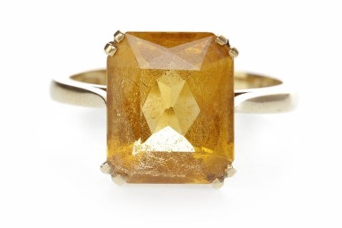 Lot 647 - NINE CARAT GOLD CITRINE RING with an mixed cut...