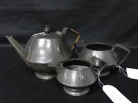 Lot 151 - ART NOUVEAU HAMMERED PEWTER THREE PIECE...