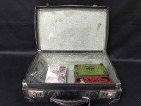 Lot 342 - SMALL ATTACHE CASE containing some old tins...